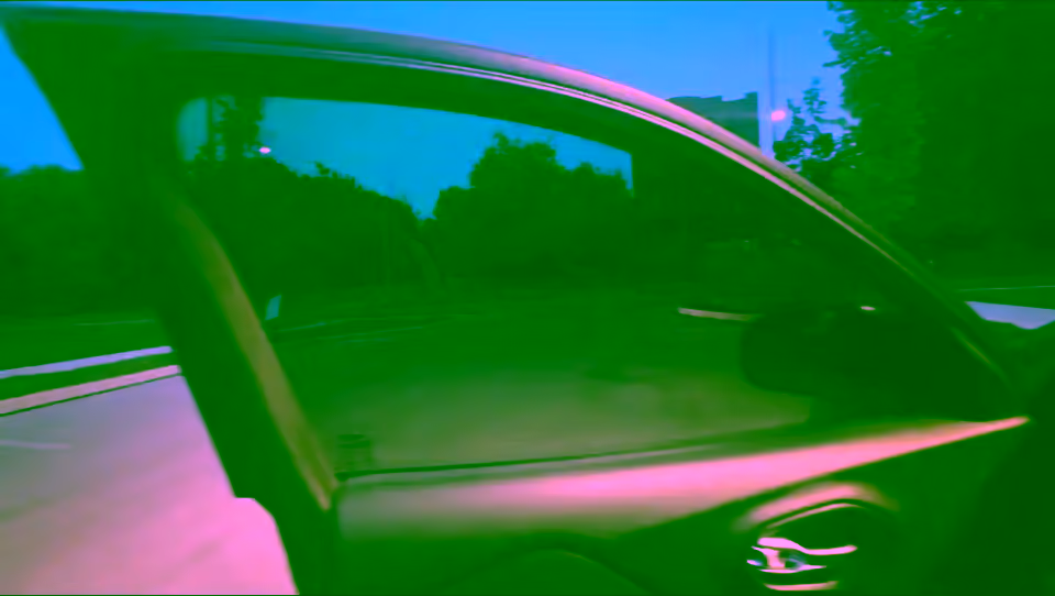View through a tinted front window at dusk
