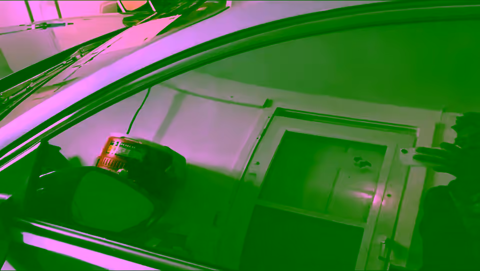Freshly installed tint on a front door window in the shop