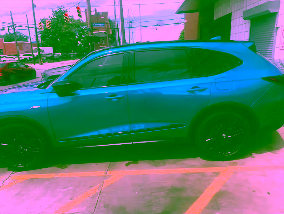 Blue Acura MDX A-Spec after full window tinting